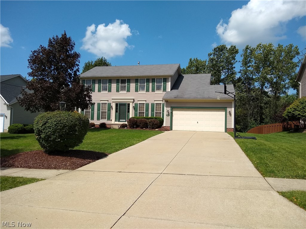 A wonderful Eaton Estates center hall colonial with 4 bedrooms, and 2.5 baths.  This home features over 2700 total square feet of living space with the finished basement.  A lovely fireplace highlights the large family room.  The kitchen is open, and features a center island.  Each of the bedrooms is spacious, and the master suite has a garden tub. There is plenty of storage, a first floor laundry, 2 car attached garage, large deck, large yard, and so much more.