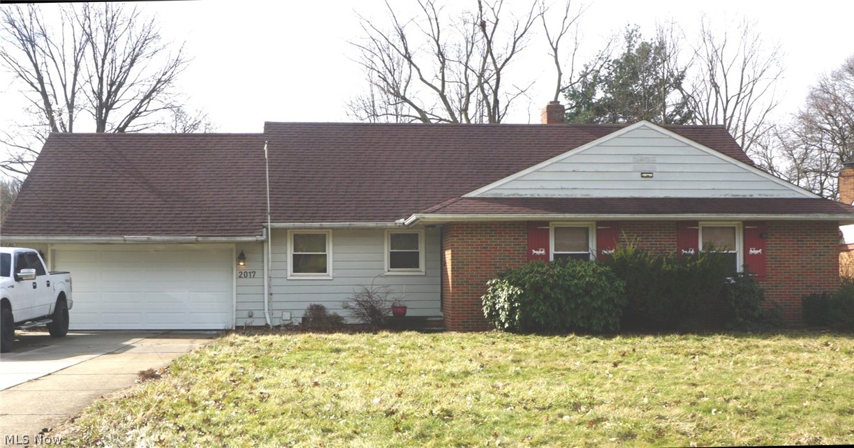 What an addition to your investor portfolio! Partially renovated bungalow in residential Euclid, just a few blocks from Indian Hill elementary school.  There is plenty of living space with room to renovate and grow!  The two full bedrooms on the first floor include an oversized primary with en suite bathroom and an additional generous sized bedroom.  The fully renovated galley kitchen has enough room for a breakfast table but families needing more room can spread out in the adjoining designated dining area. The living room boasts a floor to ceiling brick fireplace, large picture windows and access to the covered rear porch / patio.  The finished basement living space includes a full bath and built-in bar with additional space designated for laundry and storage.  Two car attached garage, large yard, great neighborhood -  whether buying as investment or as your future home, this property has much to offer!  
This property is tenant occupied through January 2027 at $1600 per month.