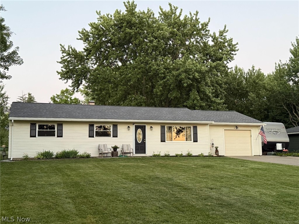 Step inside this charming, well-maintained 3 bed, 2 full bath home offering comfortable single-level living. SIGNIFICANT IMPROVEMENTS create a true move-in-ready home! Including: newer roof, gutters, downspouts, windows, hot water tank, boiler, mini-split HVAC unit, tankless water heater, paint, trim, and flooring throughout!  The bright, inviting living room flows into an expansive eat in kitchen offering ample cabinet and counter space perfect for hosting, with updated tile flooring, countertops, and stainless-steel appliances. Off the large dinette is a GENEROUS ADDITION perfect for a family room or playroom. The bedrooms offer ample square footage and flexibility for guest accommodation or home office. The home also features TWO BEAUTIFUL RENOVATED FULL BATHROOMS and a LARGE LAUNDRY ROOM equipped with upper and lower cabinets and countertop. Entertain or unwind on the SPACIOUS PATIO. Enjoy low-maintenance landscaping and a fenced backyard. Additional highlights include an OVERSIZED 1.5 CAR GARAGE, ideal for a workshop, home gym, or extra storage, plus attic access for even more space, a gravel parking pad off the cement driveway, and a LARGE SHED. Just a short walk to the community splash pad and the city’s planned all-inclusive playground! Conveniently located minutes from various dining options, schools, local parks, and major commuter routes.