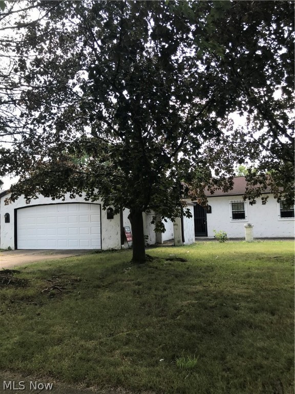 Make this property your own! This 3-bedroom ranch has so much potential. It is spacious with a living room and a family room. The family room has a fireplace and sliders out to the deck.  The kitchen is open to the family room as well. It has one full bath and a half bath. There is an attached 2 car garage. The backyard is fenced and private. The roof is approximately 7 years old. The seller is selling as is.