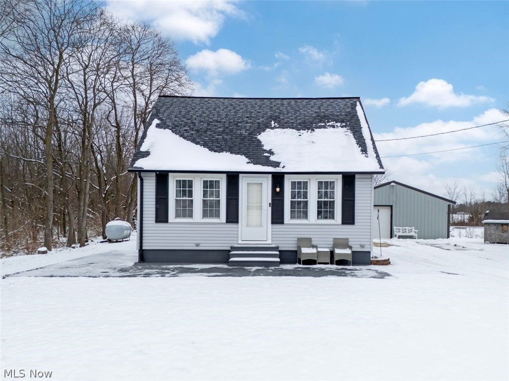 Welcome to 3062 Myers Rd., a well-maintained & thoughtfully updated home situated on approximately 0.69 acres, offering space to spread out both inside and out.

This home features two bedrooms, including a generously sized first-floor primary bedroom and private second-floor bedroom.  Just off the upstairs bedroom is a large bonus room/closet, providing excellent flexibility for a home office, nursery, hobby room, or additional storage.

The first floor offers a comfortable layout with a living room, dining area & kitchen featuring newer counters, flooring & backsplash.  The fully remodeled bathroom (2025) was completely gutted & redesigned & includes modern finishes, a Bluetooth exhaust fan, and a stackable washer and dryer (2025) that will remain with the home.  Additional laundry waterlines still available in basement.

The partially finished basement includes drywalled walls, finished ceilings, and painted concrete flooring along with a separate utility area.  Major mechanical updates include a electrical panel, newer furnace, hot water tank, smart thermostat, (garage) generator plug for the home, duct cleaning, LED lighting, & updates throughout.

Outside, the property offers a one-car garage along with additional gravel parking and storage space from the former barn area.  A newly added outdoor entertaining "party pad" with strung lights provides a great place for gatherings.  Exterior updates include newer doors, gutters with gutter guards & improved lighting.
**kitchen stove, refrigerator, dishwasher, washer, dryer stay.  All appliances in garage DO NOT CONVEY with sale**electric fireplace in living room stays**