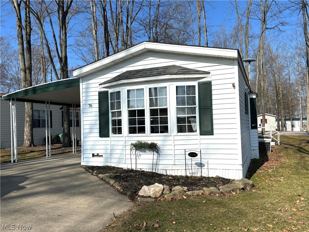 This absolutely beautiful mobile home is completely remodeled. As soon as you enter the front door, you will be impressed with the relaxing and comfortable decor. New flooring and carpeting, new light fixtures, and all walls freshly painted. Kitchen cabinets give it a sleek modern feel. All appliances included, and stackable washer and dryer. New kitchen countertops being installed as well as new bathroom sink and counter. Primary bedroom has double closets and new ceiling fan. Second bedroom currently being used as sitting room. Second bathroom includes walk in shower. Additional storage throughout home. Gas furnace and central air for year round comfort. Carport and shed for extra storage. This Victorian model home is located in Southern Terrace Mobile Home Park, a 55+ community. Purchasers must be approved by park management. For additional information, contact park manager. Lot rent is $499 monthly and includes trash service.