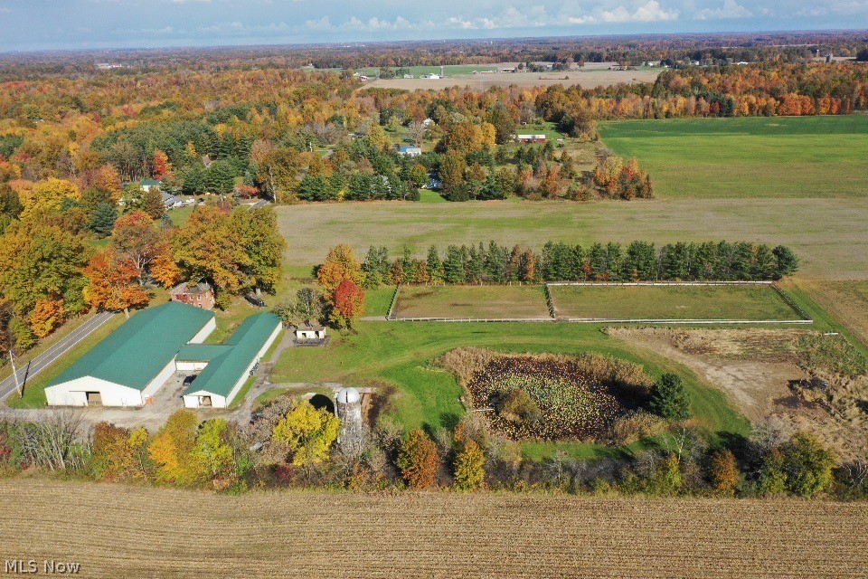 Welcome to The Stables At Windy Acres, a turn key income producing equine boarding and training facility. Offering 26 total stalls, 22- 10’x10’, 1-12’x10’, 1-10’x8’ and two 12’x12’ stalls with all weather runs. Oversized 150’x76’ indoor arena with state-of-the-art dust free footing. A 340 sq. ft. finished and fully
furnished viewing room to overlook the arena. Recently added feed room with plenty of storage. Newly designed hot/cold wash rack with sink. Custom tack lockers (26) equipped with saddle racks and bridle hooks. Property currently has two oversized pastures for use. Additional Improvements with in the last three years include extensive earth work to the grounds, levelling and fully matting all stalls, ‘all weather’ walkways on grounds, adding new daily use equipment, reworked/ added and treated arena footing (dust free) and more lighting. No Trespassing! Showings only with a licensed Realtor! PROPERTY IS OWNED BY LICENSED REALTOR.