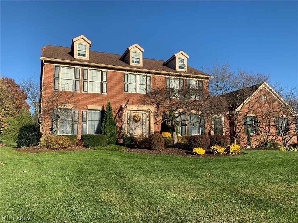 Beautifully maintained Colonial on private cul-de-sac lot in Greenbriar Hills.  This home was built by Tom Moock and has a gorgeous timeless cherry kitchen and elegant woodwork. Sun room was added in 2016. Furnace was replaced in 2015. Granite added in bathrooms and laundry room in 2018.  Beautiful large lower level is sure to please! Fully landscaped lot with sprinkler system.  Great buy in Jackson Township!