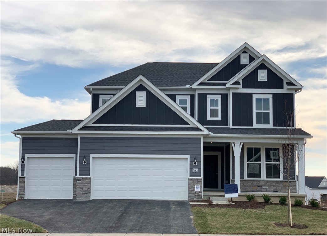 This is a great new 3 bed 2.5 bath home in Pioneer Crossing. The kitchen has stainless gas appliances, white lillian cabinets, a quartz counter, pendant lighting and a tile wall backsplash. The owners bath has white lillian cabinets, a tile shower wall and a walk in closet. An additional 2 bedrooms, a full bath, a loft and laundry complete the 2nd floor. An eating space off the kitchen, an extended great room, a flex living space with glass french doors, walkout basement with 9' ceiling and a 3 car garage round out the home. At Pioneer Crossing you'll love being central to all the action. Minutes away from great shopping, dining, and entertainment options. Put this home on your must see list.