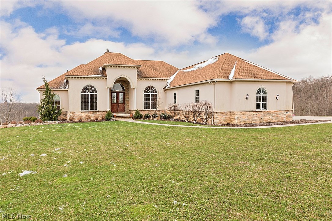 WONDERFUL PRICE REDUCTION !!! This Spacious home sits on top of a hill overlooking peaceful green space in lovely Sterling Glen.  Award winning school system, easy access to major highways and close proximity to excellent dining, shopping and entertainment, but away from the hustle & bustle. The open spacious floor plan is perfect for todays style of living. with vaulted ceilings and over 7,200 square feet of finished living space! The gourmet kitchen opens up to a huge deck that overlooks one of the original polo fields, and you will be able to enjoy an occassional game of polo. All of the major mechanical systems (furnace, high efficient tank-less water heater etc) are newer and has been maintained flawlessly. The Master Suite is exceptional with an abundance of closet space & a Jacuzzi to relax in at the end of a busy day. Then enjoy a movie in your private movie theatre. This home has neutral decor throughout and allows for one floor living, if you so choose. Make this your dream h