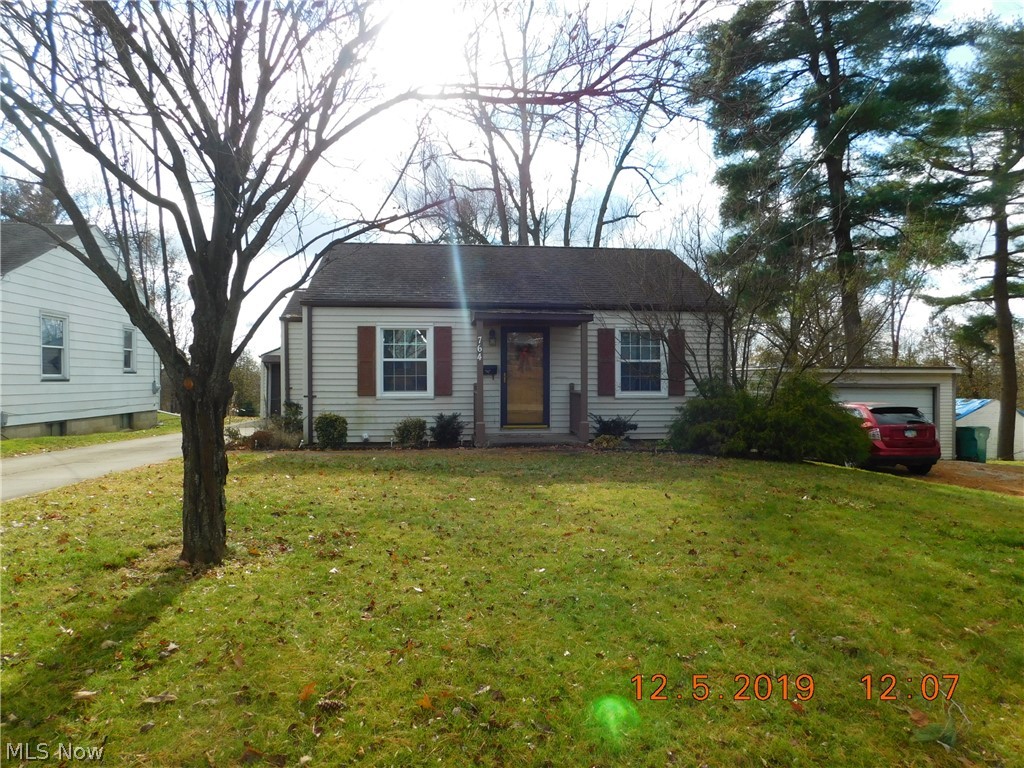 Charming 2 Bedroom Bungalow...Details of days Gone by combined with updated Kitchen that leads to enclosed porch... Beautiful hardwood floors thru-out... Large fenced-in yard... Oversized 1.5 car garage... Updated lifetime warranty windows, new water heater, update stainless appliances... This is the one! $6.00 yearly Muskingum Watershed Assessment...
