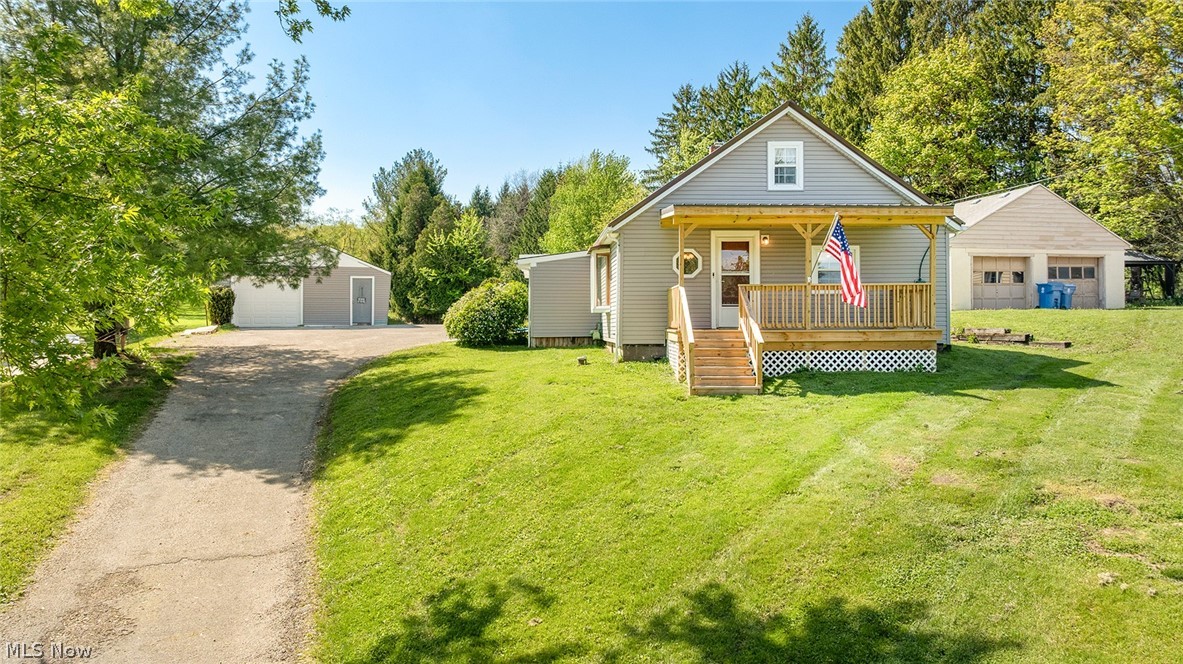 Welcome to 3002 Clark Mill Rd. in the City of Norton. This charming bungalow sits on a spacious 1.95-acre lot, offering privacy, room to roam, and excellent potential for future expansion.
Recent updates include new LVT flooring (2024) throughout most of the first floor and a beautifully updated main bathroom (2025) and front porch. The kitchen features ceramic tile flooring and opens seamlessly into the living room, creating a bright and functional living space. Upstairs, the bedroom and additional room are enhanced by skylights that fill the spaces with natural light.
A sunroom with 1/2 bath addition at the rear of the home provides a peaceful retreat and walks out onto a covered patio—perfect for relaxing or entertaining. Major mechanical and exterior updates add peace of mind: a new furnace and A/C (2025), along with a metal roof and new siding installed in 2021.
This deep, expansive lot is a standout feature, providing endless possibilities for outdoor living, gardening, workshops, or additional structures.
Conveniently located, the home is just 6.9 miles from downtown Akron, 16 miles from the Akron-Canton Airport, and approximately 41 miles from Cleveland Hopkins International Airport.
