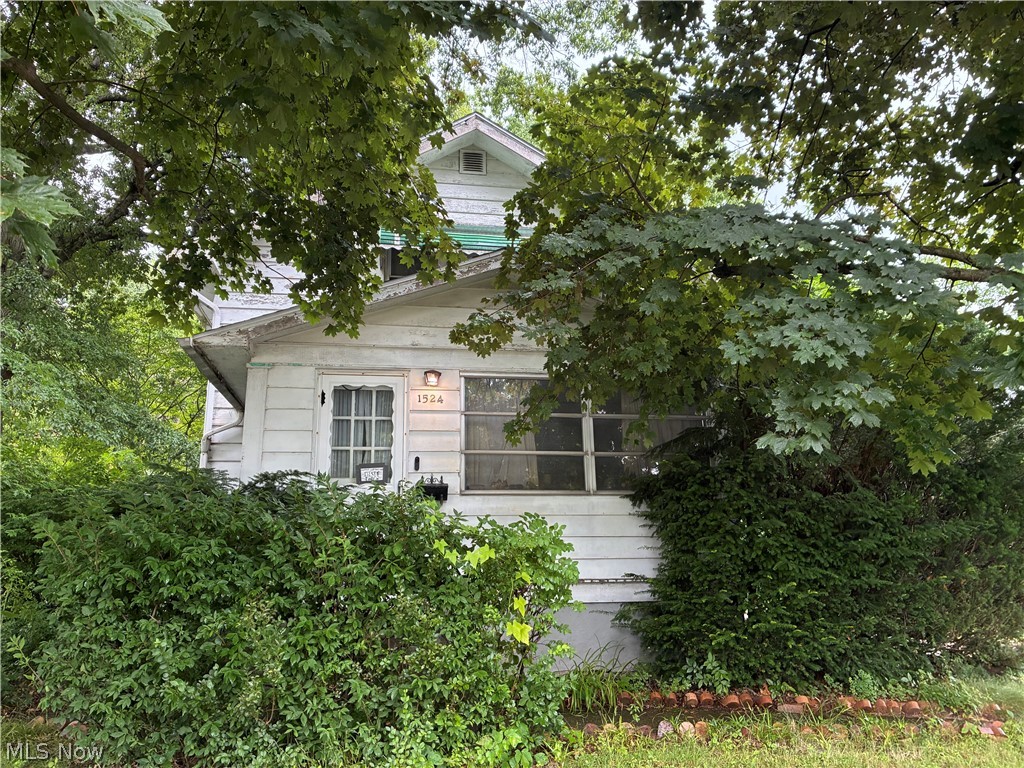 Great Investment opportunity in Massillon providing a house on a double lot and also an additional lot around the corner on Woodland totaling .45 acre! The home features two large living areas, a full eat-in kitchen, and also an oversized 2-car garage. With some TLC this can truly be a charming and profitable flip/rental project, don't let the opportunity pass you by!