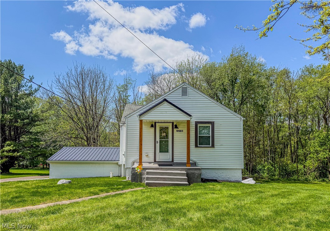Fall in love with this polished gem! Though cozy in footprint, this home lives large with a "precious" yet spacious feel. Every room is designed to maximize comfort without sacrificing an ounce of style, proving you don’t need massive square footage to have grand ambitions. The airy kitchen shines with granite countertops, stainless steel appliances, and endless cabinetry. The smart layout features a main-floor master next to a full bath with a double vanity and soaking tub. Downstairs, find a generous second bedroom, a dedicated work-at-home or craft area, and a second updated bath with a shower. A large laundry/storage room keeps life organized, ensuring the home feels open and uncluttered. Sitting on nearly half an acre, this property offers massive outdoor freedom that extends your living space well beyond the walls. Extensive updates include a new A/C, water softener, garage door, and custom blinds. It is perfectly functional, meticulously maintained, and ready for you!