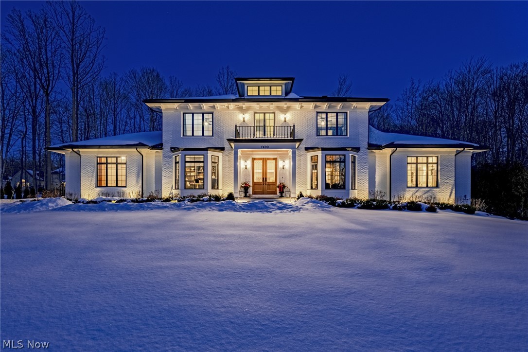 One of the finest homes ever on offer in the community of Canyon Lakes, this home is the epitome of bespoke design and exquisite detail. Recently finished in 2020, the architecture of the home is evocative of early 20th century elegance, yet perfectly suited to the needs and demands of modern living. Once inside, the incredible craftsmanship is immediately evident, from the rich millwork to the tasting room complete with a wine refrigerator and cigar humidor. The gourmet kitchen is open to the living and dining room, with wood burning fireplaces nestled in each. The kitchen boasts a sixty inch Hallman range, custom quartzite counters and an oversized eat-in island with contrasting cabinetry. Directly off the kitchen, the living room opens to a screened-in porch with an additional third fireplace. With a custom walk-in closet, a spacious bedroom, a laundry room, and a luxurious en-suite bath, the owner's suite provides spa-like comfort with picture-perfect finishes. Two powder rooms, a