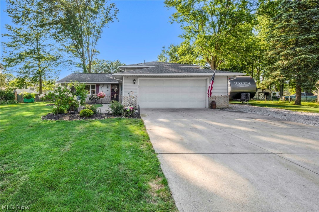 Welcome home to this beautifully updated North Ridgeville gem, where modern style meets everyday comfort. From the moment you step inside, you'll appreciate the inviting open-concept layout that seamlessly connects the living, dining, and kitchen spaces, creating the perfect setting for entertaining or relaxing with family.

The heart of the home is the stunning kitchen, featuring new cabinetry, updated countertops, and a large center island that's perfect for meal prep, casual dining, or gathering with guests. Updated flooring flows throughout the home, adding a fresh, cohesive feel to every room.

Outside, you'll find an impressive 24' x 24' outbuilding, offering incredible flexibility for a workshop, hobby space, extra storage, or even a home business. It's a rare feature that adds tremendous value and endless possibilities.

Located in the heart of North Ridgeville, you'll enjoy a vibrant community with beautiful parks, shopping, dining, and convenient highway access while still experiencing the charm of a peaceful neighborhood.

Recent updates include a new refrigerator (2025), dishwasher (2026), range (2026), air conditioner (2026), and water heater (2019), providing added peace of mind for the next owner. 

Whether you're gathering around the oversized kitchen island, enjoying the beautifully updated interior, or making the most of the spacious 24' x 24' outbuilding, 5872 Emerald St. offers the perfect blend of style, function, and a place to call home.