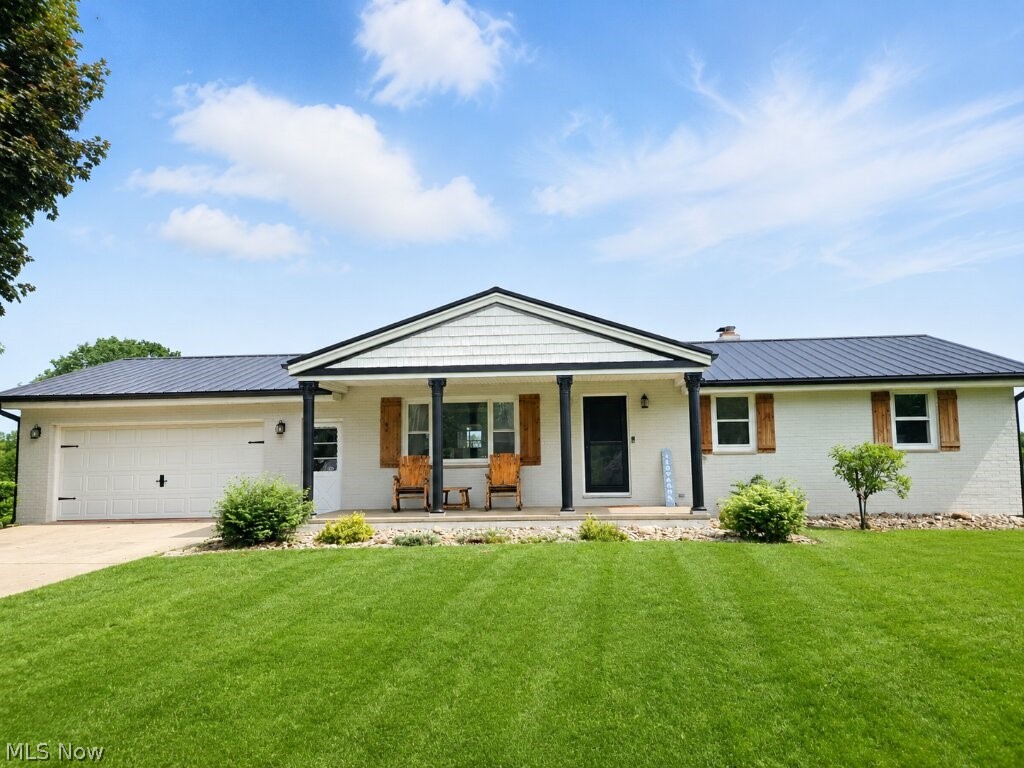 Newly remodeled ranch located on a quiet dead-end street on 0.46 acres with a peaceful country setting and beautiful backyard views overlooking Pleasant Acres Pond, which is fully stocked with fish and perfect for fishing.

This home offers 3 bedrooms, 2 full bathrooms, and a half bath connected to the master bedroom.

The updated kitchen features granite countertops, a large island, recessed lighting, and modern finishes. The home has new flooring and carpet throughout, updated bathrooms, and recessed lighting. Recent exterior updates include a metal roof and gutters for added durability and peace of mind.

Enjoy the added living space of a sun porch with a deck, perfect for relaxing, entertaining, or taking in the pond views. The partially finished basement includes additional finished living space, an office, and a porch leading to the backyard.

The property also features peach trees, plenty of outdoor space, and a scenic setting that offers privacy, comfort, and room to enjoy the outdoors.

Move-in ready with updates inside and out — this home combines modern finishes, extra living space, and a peaceful location.

Located in Louisville Ohio with Louisville city schools!