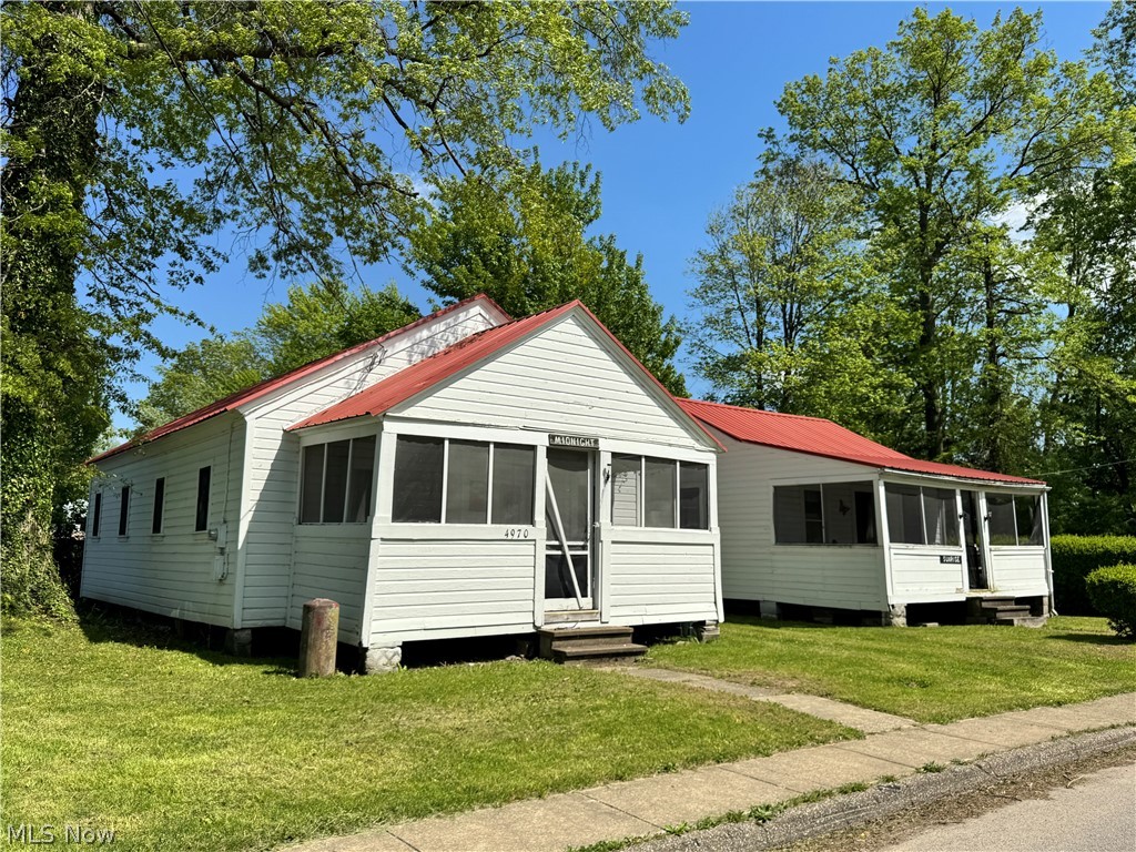 Great opportunity close to Geneva on the Lake main strip! Two cottages offering a total of 6 bedrooms and 2 full bathrooms. Newer metal roofs, both have screened in front porches to enjoy gathering with your group. Address 4970 Presidential is 704 sq ft with 4 bedrooms, a spacious living room, Eat in Kitchen and full bathroom. Located on the corner of Lake Rd and Presidential. Utilities are 4970 feed to the second home at address 4966 Presidential.  Address 4966 Presidential is 404 sq ft with 2 bedrooms, a living room, eat in kitchen, and full bathroom. Smaller lots for little yard maintenance with an area to enjoy too. Public water and sewer. Selling as-is. Cash only. No heating sources. Additional home on 4975 Presidential - MLS# 5211381. Seller would like to sell all together.