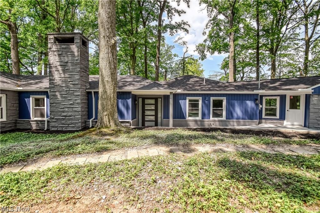 Beautifully renovated from top to bottom, this exceptional 3-bedroom, 2.5-bath ranch is tucked away in a serene, wooded setting offering privacy, tranquility, and modern luxury throughout. The open-concept design features a stunning gourmet kitchen with premium cabinetry, sleek countertops, stainless steel appliances, and seamless flow into the spacious living and dining areas—perfect for both everyday living and entertaining.

The owner’s suite serves as a private retreat with a spa-inspired bath showcasing designer fixtures and upscale finishes. Thoughtful updates and refined details can be found throughout the home, creating a warm yet sophisticated atmosphere.
To the studs all electric is new and all plumbing to the entire is new.  Furnace newer and AC 2025. Roof is replaced in approx last 5 years.

Step outside to your own resort-style oasis featuring an expansive deck and patio overlooking the inviting in-ground pool, ideal for summer gatherings or peaceful relaxation. A charming chiminea adds warmth and ambiance for cozy evenings under the stars. Surrounded by mature trees and lush landscaping, this property offers the feeling of a private escape while remaining conveniently close to shopping, dining, and local amenities. To the studs all electric is new and all plumbing to the entire is new.  Furnace newer and AC 2025. Roof is replaced in approx last 5 years.

A rare opportunity to enjoy turnkey living in a picturesque natural setting.