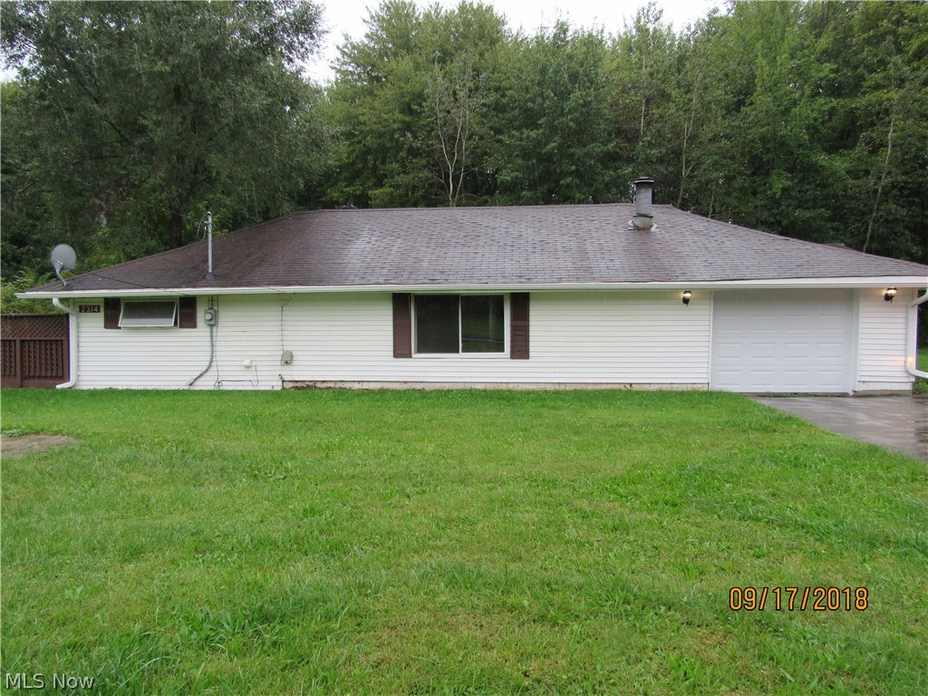 Looking for a starter home, here is one that has been completely redone. The home has been completely gutted and redone,  Large eat in kitchen with new cabinets, new countertops and ceramic floor. Ceramic floor extends down hall to door leading to backyard. New updated bath also with ceramic floor. Small laundry room off kitchen. Partial basement with access from outside. 1 car attached garage, plus large detached garage which could hold Larger vehicle. New well pump, pipes and Hot Water Tank. Owner in the process of putting in a new septic system and new furnace.  Everything will be done and all you will need to do is move in.  Home Warranty also included.
