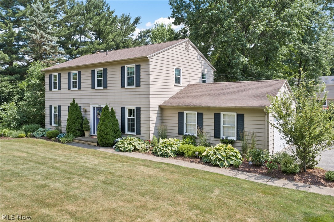 Beautiful, tree-lined home in Hudson!  Lots and lots of updates!  Totally renovated kitchen in late 2017.  Solid hardwood floors throughout.  Two season room made into a four season adding 280 sf.  New since 2012:  roof, windows, kitchen, furnace (2020), water heater, electric box, water softener, sump pump, well pump, four season room, waterproofed basement, lots of landscaping.   Private shaded back yard with large trees and fire pit.  Sits far back from the road.  Warm and inviting home, lovingly maintained.  Sidewalks from Middleton to Brandywine to be completed in 2021.  Tax records and realty sites not accurate on square feet and renovations.  Please plan to wear masks and gloves for showings.  Gloves provided.
