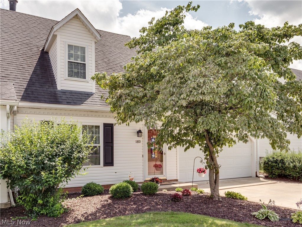 Spectacular end unit condo in beautiful Rockport Colony.  This meticulously kept home features an open floor plan with vaulted ceilings, a spacious living room with a gas fireplace plus a family room.  The kitchen offers updated counter tops, stainless steel fridge, flooring and is the perfect size for any cook.  The first floor also includes the convenience of a bedroom, a full bath and a laundry room. The second floor boasts a huge loft area plus two more bedrooms.  There is plenty of storage that is easily accessible from the master bedroom.  Updates include, furnace, A/C, windows, carpeting and roof.  All three bathrooms have updated fixtures, flooring and toilets. The exterior of the condo has lots of green space that you will enjoy while sitting on your patio that features an electric awning. Nothing to do but move in!  Don't miss out on seeing this incredible property.  Call for your private showing today!
