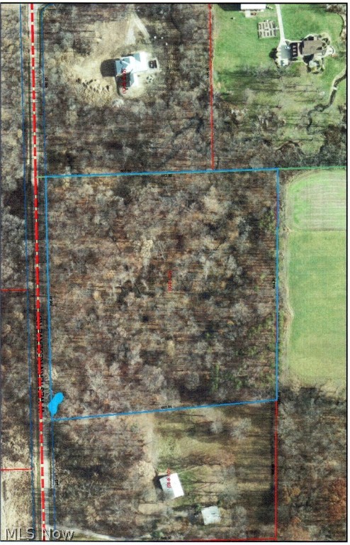 This might just be what you have been waiting for! 10.42 wooded acres, Green Twshp. South Range Schools.