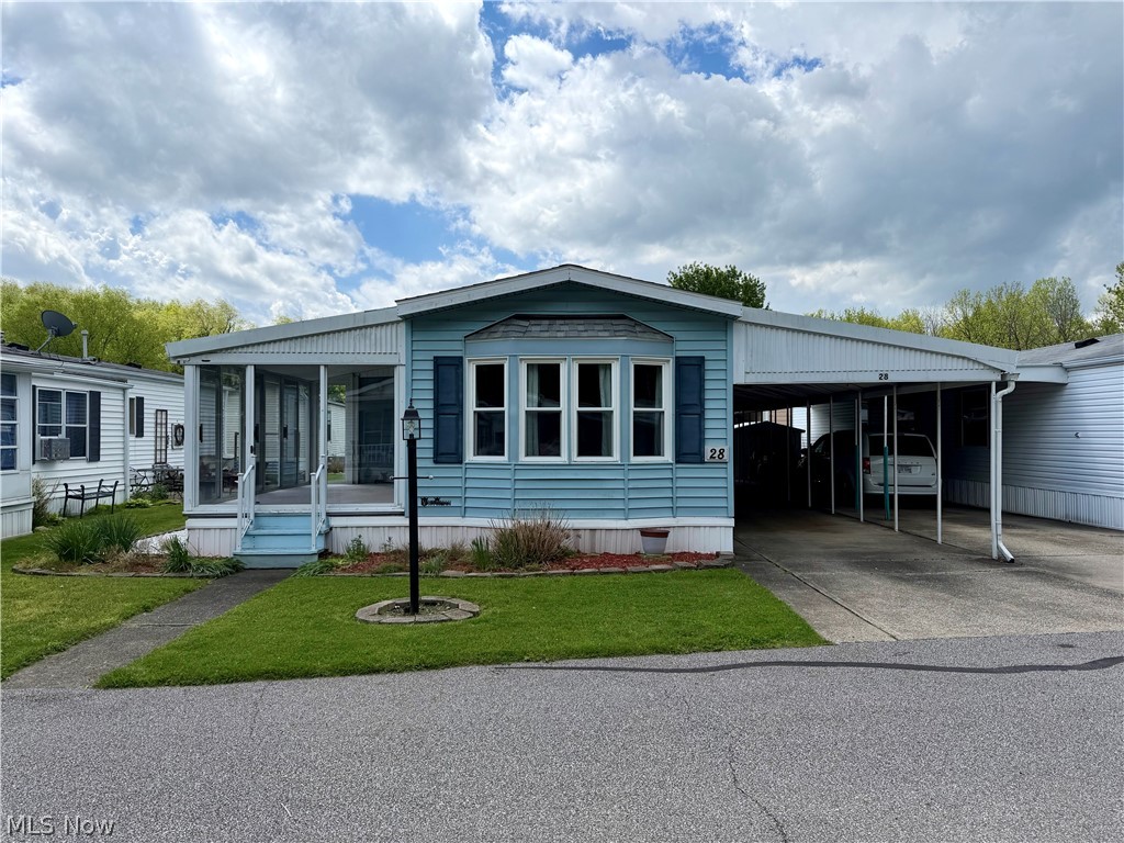 Check out this well-maintained, one-story home in The Willows of Springfield Twp! Featuring a new roof and gutters (2025), all new windows (2024), and new AC (2024). The floor plan includes a large living room with vaulted ceilings, a spacious kitchen with lots of cabinets, and a separate dining area with built-ins. You’ll love the 3-season room that has a natural gas hookup, and could potentially be used year-round with a heater. The master bedroom has a private bathroom with walk-in shower. Down the hall you’ll find a 2nd bedroom, and a 2nd full bathroom with laundry inside. The oversized, attached carport keeps your vehicles safe from the elements. There’s also a big shed for extra storage. This community has a clubhouse that residents can reserve for events. Enjoy low-maintenance living in this quiet, 55+ neighborhood. Call today to schedule your private showing!