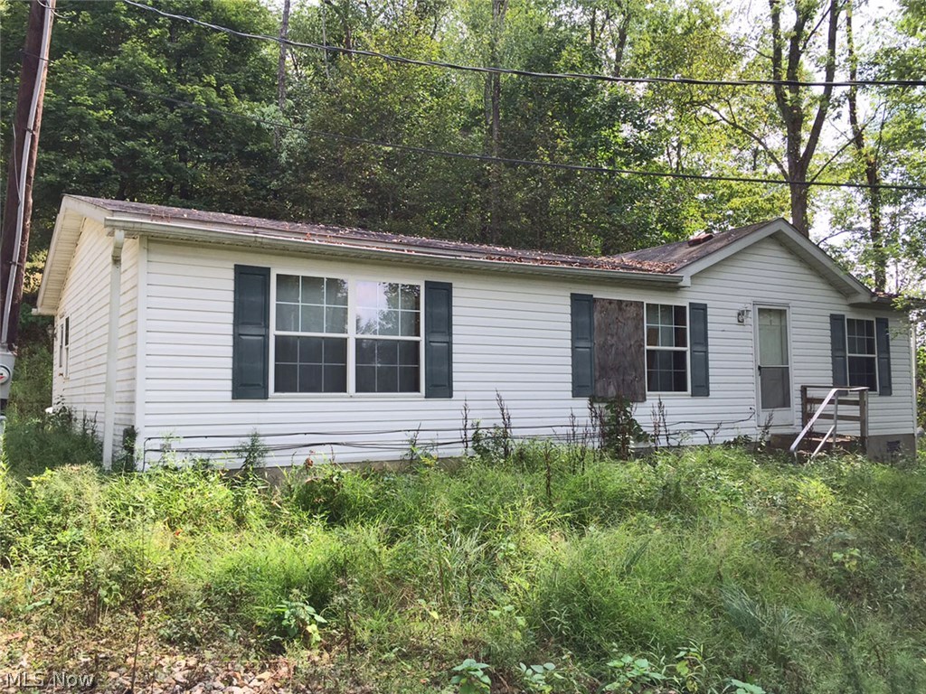 Absolute auction, all sells to the highest bidder on location on THURSDAY – OCTOBER 1, 2015 -1:00PM. Handyman Home w/ Garage - 2000 Double Wide Home – ¾ Acre Land - Indian Valley Schools - Tuscarawas Co. – Midvale, Ohio.  Consists of .78 acres of land with 2000 model double wide home on permanent foundation. 3 bedrooms, 2 baths, and gas FA furnace. Detached 1.5-car garage (needs finished). Current taxes $452.92 per half year. Come prepared to buy! 
**TERMS ON REAL ESTATE: 15% down auction day, balance due at closing. A 10% Buyer’s premium will be added to the highest bid to establish the purchase price.  Any desired inspections must be made prior to bidding. All information contained herein was derived from sources believed to be correct. Information is believed to be accurate but not guaranteed.