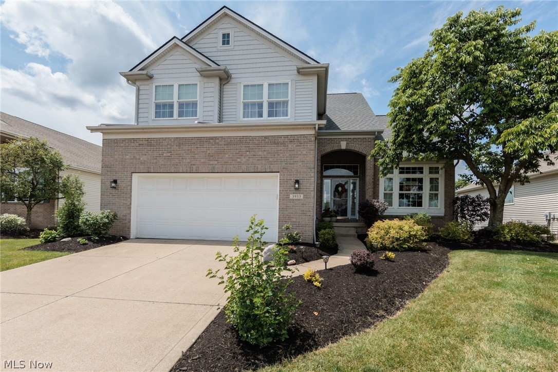 Welcome to this beautifully maintained waterfront cluster home in the highly desirable Fox Meadow Country Club community! Offering 4 bedrooms, 3.5 baths, and spectacular lake views, this home combines elegance, comfort, and a carefree lifestyle. The spacious eat-in kitchen features granite countertops and an oversized dining area perfect for a sunroom or cozy sitting space, with sliding doors leading to the second-story deck overlooking the tranquil water. The formal dining room is open to the welcoming foyer, creating an inviting space for entertaining family and friends.

The spacious great room features a warm fireplace and abundant natural light, while the private owner's suite offers peaceful lake views—the perfect place to begin and end each day. A convenient first-floor laundry room adds everyday functionality.

The finished walkout lower level provides exceptional additional living space with a large recreation room, full bath, and flexible accommodations that are ideal for guests, an in-law suite, or multi-generational living.

Additional highlights include a two-car attached garage with a separate golf cart garage, new roof (2025), and low-maintenance living in one of the area's most sought-after communities. Enjoy the beauty of waterfront living with easy access to golf, dining, and all the amenities Fox Meadow has to offer.