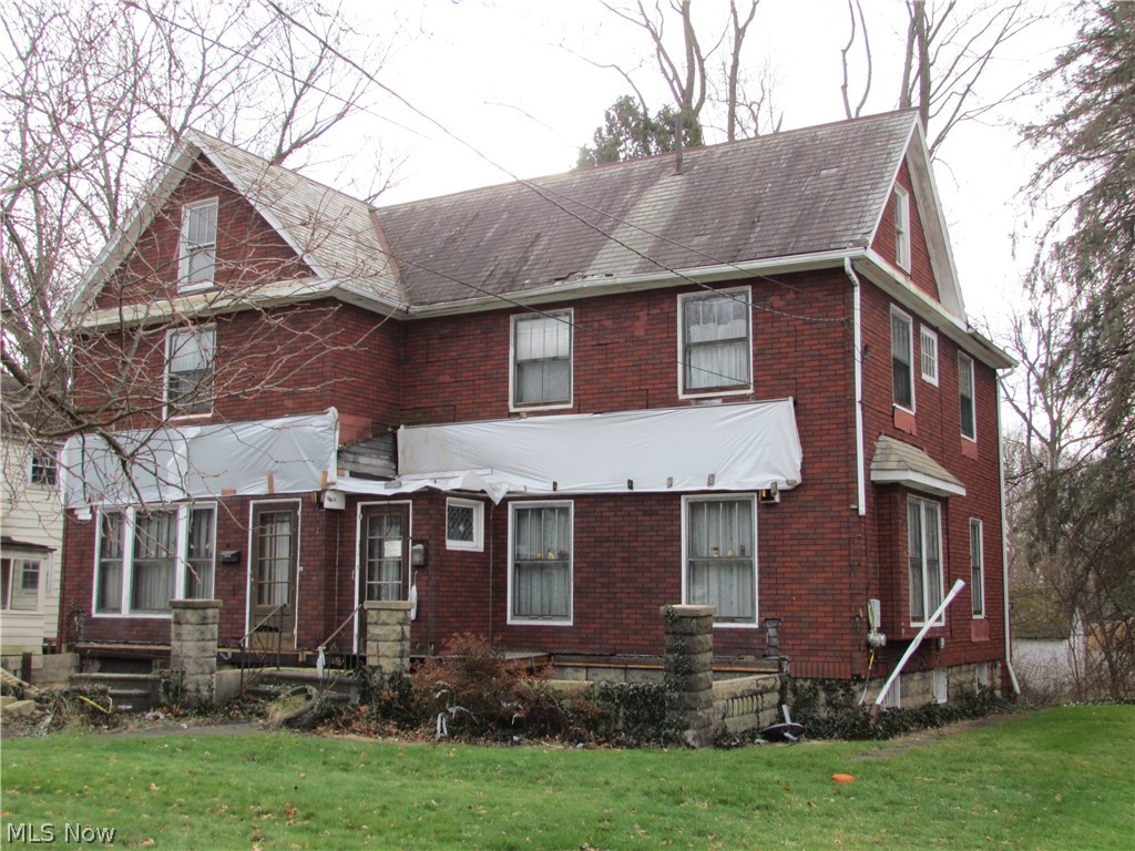 Two unit property on West Main Street, less than one mile from Kent State University campus. Each unit has two bedrooms, a full bathroom, living room, kitchen, dining, foyer and a full basement. Public water and sewer. Two car detached garage. All resting on a .31 acre lot. Bring your tool belt or contractor, and restore this property to it's potential! Strong rental market with premium rent potential. Call to schedule your private viewing today.