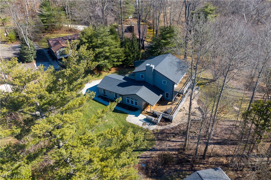 WELCOME TO THE LAKE! 2885 Lodge Rd SW Sherrodsville OH 44675 Magnificent Lake Home on Atwood Lake w/ private dock, watch sunsets from the shore or take your pontoon out for relaxing cruise or head to several eateries on the lake w/ your friends & family! 5 Bedrooms, 3.5 Bathrooms, 2 Car Garage, 2 Master Bedrms for mutigenerational living or friends enjoying game night & making lifetime memories. Complete reno of 1st floor + Addition, 1st flr Laundry & new garage! STUNNING Kitchen, multiple Quartz counters & tons of cabinets, enjoy cooking & entertaining w/ eat-at bar & serving area! Beautiful Living Rm w/ Dining by wood burning fireplace & separate newer built addition Family Room for entertaining & 1/2 bath! Main Bedrm on 1st Floor w/ own full bath including slipper tub to relax & get your energy back to be ready to go out on the lake! 2nd Owner bedrm on 2nd floor also has its own full bath w/ gorgeous tiled shower & granite countertops, 3 more bedrms offer plenty of sleeping & main 3