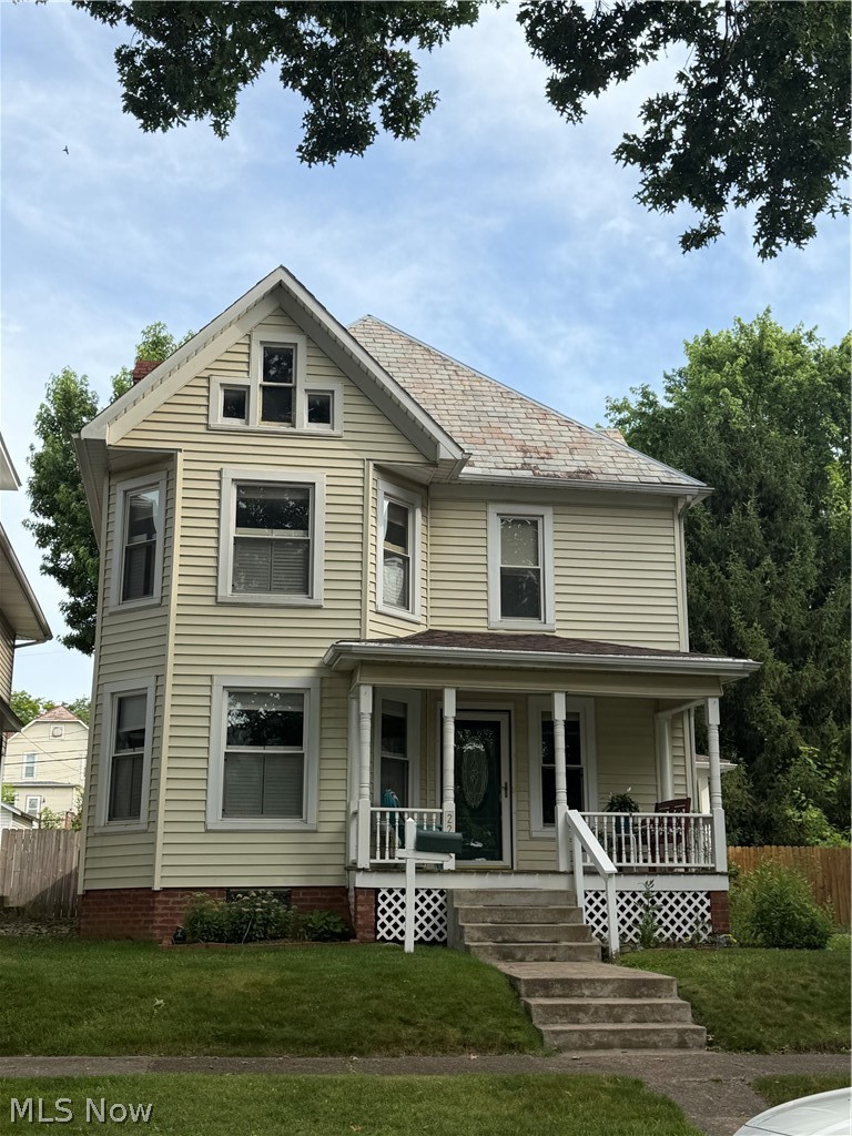 Welcome to this charming Victorian-style home with just the right number of modern updates. The home has newer floors and windows. Features: Central heat and Air conditioning. Walk into a lovely foyer with beautiful woodwork and pocket doors leading to an inviting living room. There is another set of pocket doors that lead to what could be a formal dining area or office.  The kitchen features newer cabinets and plenty of natural light. There is ample space for hosting and entertaining in the spacious eat-in kitchen; the possibilities are endless. From the kitchen, you can access the fenced-in backyard with a lovely concrete pad for outdoor entertainment. There is a detached two-car garage. This upstairs offers two nicely sized bedrooms and a possible third small bedroom. Enjoy the newly renovated bathroom as well.