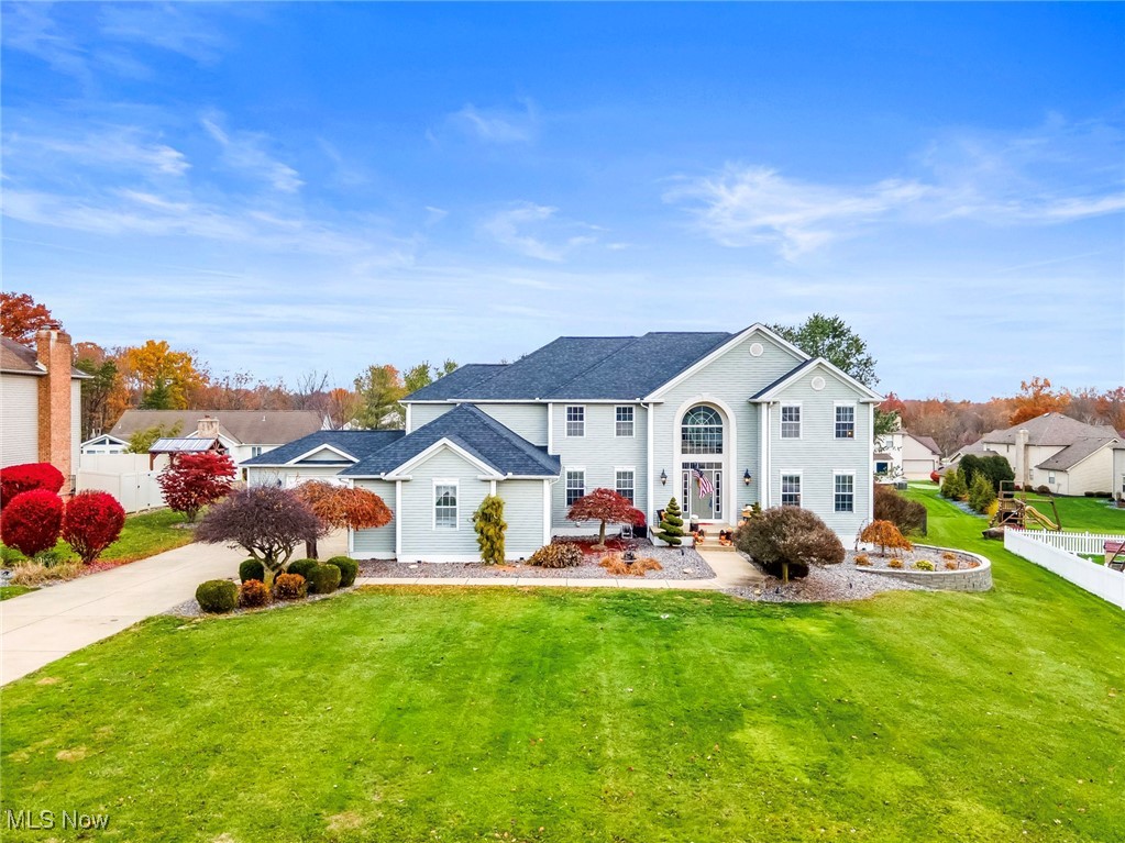 Welcome to 1050 Fox Den Trail — a showcase of elegance and comfort in Canfield’s highly sought-after Fox Den neighborhood. Known for its peaceful streets and family-friendly charm, this stunning 5-bedroom, 3.5-bath residence perfectly blends sophistication, warmth, and everyday livability.

Step through the grand foyer into light-filled, open-concept spaces enhanced by new luxury vinyl flooring, crown molding, and designer lighting. The gourmet kitchen, features gleaming granite countertops, a stylish backsplash, abundant cabinetry, and brand new appliances (2025)—ideal for the home chef or entertainer at heart. A formal dining room with a tray ceiling creates the perfect setting for gatherings, while the two-story family room, anchored by a cozy gas fireplace, invites relaxation and connection. French doors open to an elegant living room, offering a quiet retreat or flexible use for work or play. A main-level bedroom adds versatility for guests, multi-generational living, or a private home office.

The fully finished lower level is a true entertainer’s dream—complete with a custom-built bar and direct access to its own garage, making it the perfect place to unwind or host game nights. With a 3-car garage plus a 2-car extension, there’s no shortage of space for vehicles, storage, or hobbies. Step outside to your personal oasis: a saltwater pool (2022) surrounded by a fenced, landscaped yard offering both privacy and tranquility. Additional conveniences include a central vacuum, a full security system, a newer roof (2022), and brand new HVAC (2025), along with fresh paint and stylish fixtures throughout. Meticulously maintained and thoughtfully upgraded, this home delivers luxury living at its finest in one of Canfield’s most prestigious communities. Opportunities like this are rare—schedule your private showing today and experience 1050 Fox Den Trail for yourself.