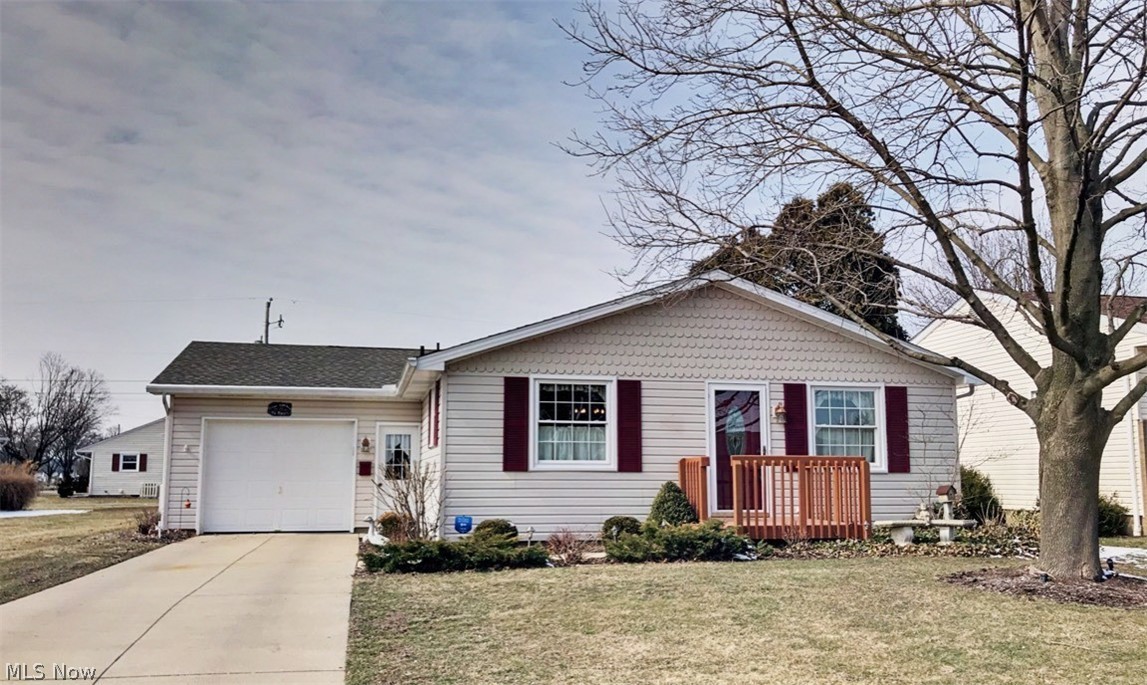 Beautifully maintained ranch home in a great location close to all amenities. This home is in move in ready condition. There are 3 bedrooms, a large full bath and an over-sized 1 1/2 car attached garage. The kitchen is newly remodeled with all new custom built soft close cabinets, Corian counter-tops and brand new appliances. The full bath has a new vanity with Corian counter-tops. The lower level has a large family room with a gas fireplace. The back yard is just like being on a private vacation. There is a covered Trex patio area, a peaceful coy pond and a 14x28 in-ground swimming pool with a new liner, pump and filter, and new winter cover. This home is very efficient with AEP Electric budget of 145.00, Dominion Gas 46.00 and New Phila Water 43.65.