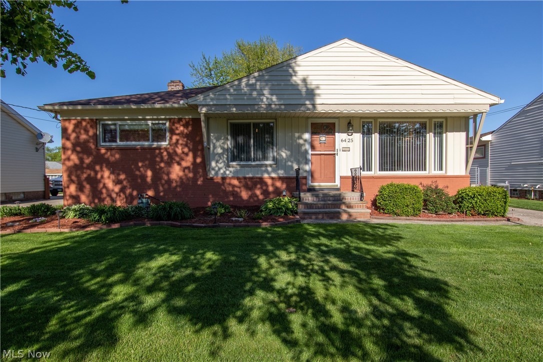 Welcome to 6425 Anita Drive! This Parma Heights ranch is nestled in the heart of the Big Creek Metropark and just steps away from shopping, dining, and more. Step inside to an open living room with lots of natural light. A dining area overlooks the lush backyard, is spacious enough for hosting, and flows neatly into the updated kitchen. Granite countertops, a tile backsplash, a stainless sink, and stainless appliances make this the perfect spot for any chef! Down the hall, discover three generously sized bedrooms, sharing a full bathroom with an updated vanity. The partially finished lower level offers even more living space, along with a second full bathroom and laundry hook-ups. Outside, catch a sunset on the patio, overlooking the partially fenced yard. An oversized two-car garage neatly houses your lawn equipment and more!