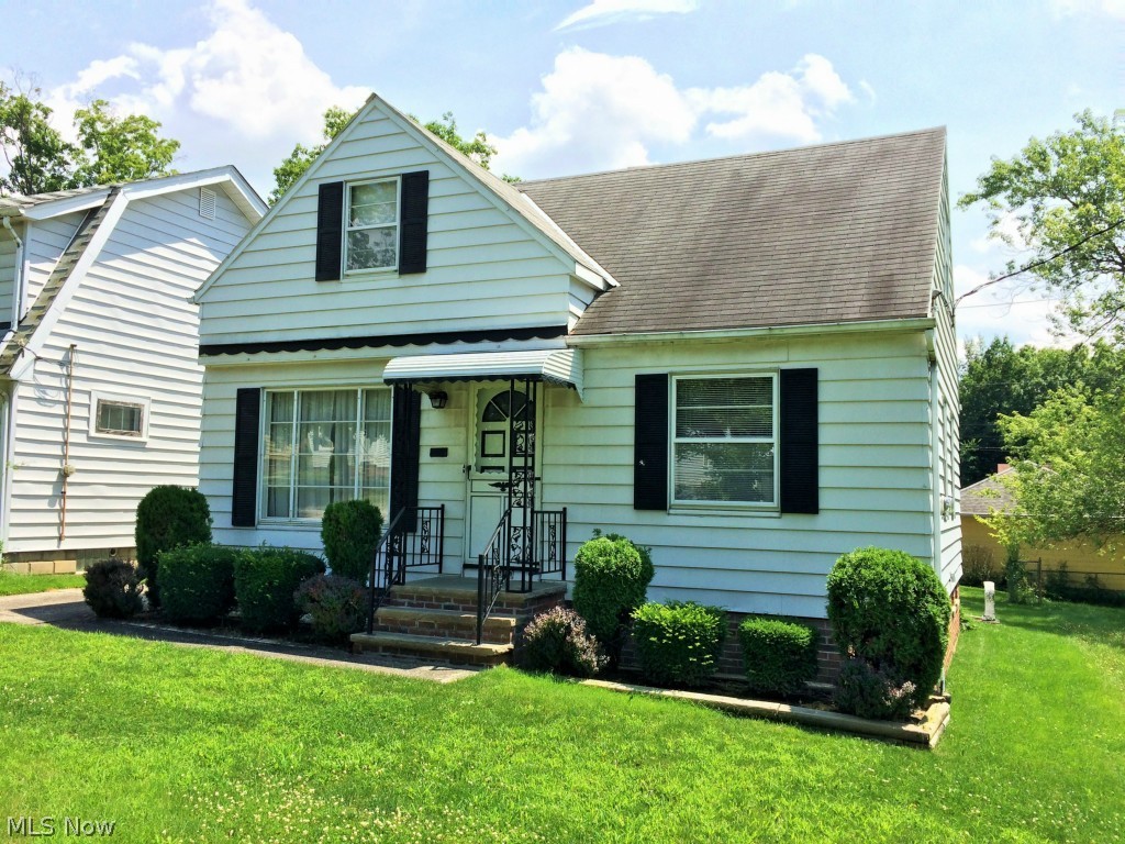 Great Maple Heights Cape Cod with 3 bedrooms and one full bath and a 1/2 bath in the basement. Newer oak cabinets, tiled back-splash in the kitchen and wall paper will be removed and freshly painted). Very nice hardwood floors throughout the first and second floors.  Basement recreation room is tiled and has a bar. Lease for two years.  Well cared for home.  Covered patio off of the two car garage.