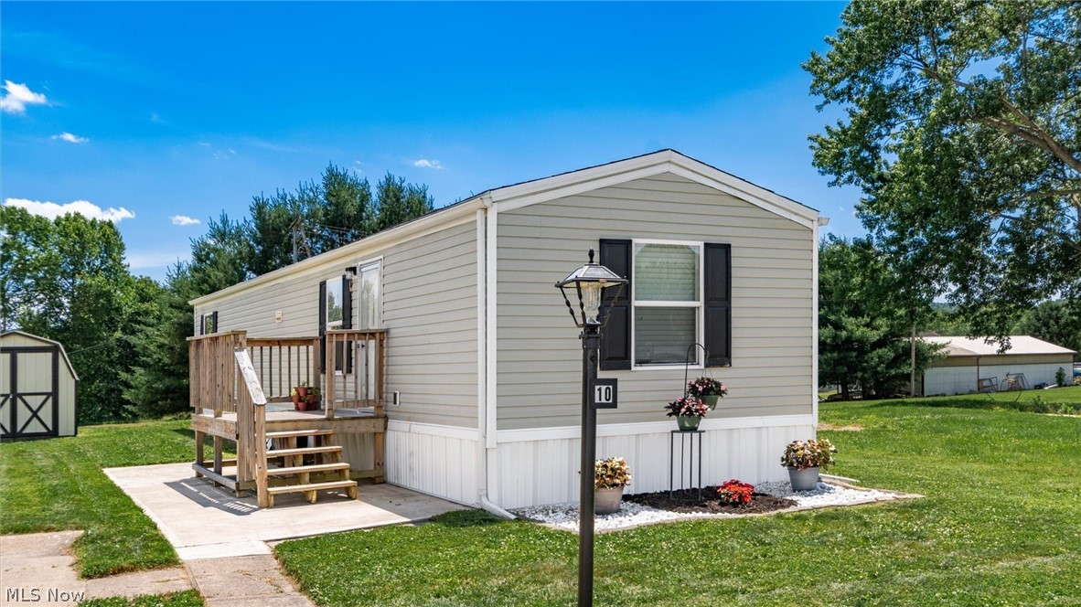 Exceptionally well-maintained and move-in ready, this 2014 Clayton home in Chateau Estates offers comfortable, low-maintenance living with an open floor plan and major recent updates, including a new roof and mini-split heating and cooling system installed in 2024.
Featuring 2 bedrooms, 1 full bath, laundry room, and an open-concept living room, dining area, and kitchen, the layout is both functional and inviting. The open design and generous living spaces make the home feel larger than its footprint.
Additional features include an electric forced-air furnace, added pantry and storage space, a welcoming front porch, a private rear patio area, and a newer storage shed that conveys with the property. The spacious lot provides room to enjoy the outdoors while remaining easy to maintain.
This home has been exceptionally well cared for and is ready for its next owner. Buyer is subject to park management application and approval. Monthly lot rent applies.
