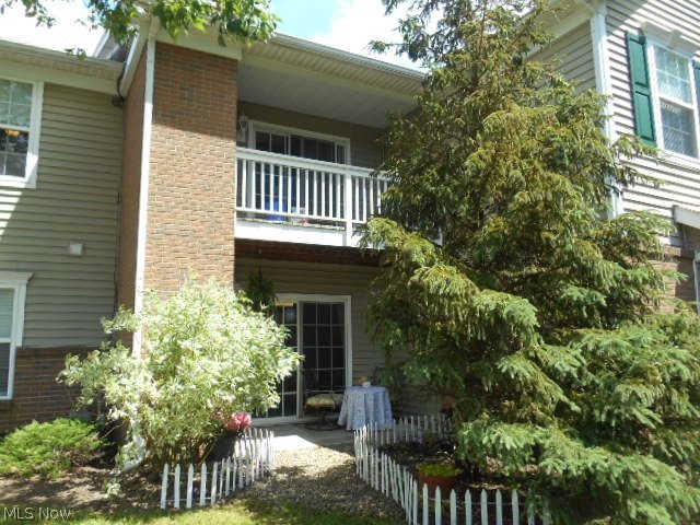 Gorgeous end unit ranch 2 bedroom, 2 bath first floor condo with private patio and greenspace view.  This adorable condo has been freshly painted, newer flooring, oversized bedrooms, great room with fireplace and vaulted ceilings, detached 1 car garage, large master suite with walk in closet and updated bathroom, open kitchen with a pantry/laundry room and plenty of storage.  Why pay rent when you can buy this beautiful condo located in Revere Schools.  This is a must see and move in ready! Call today for your own private showing.