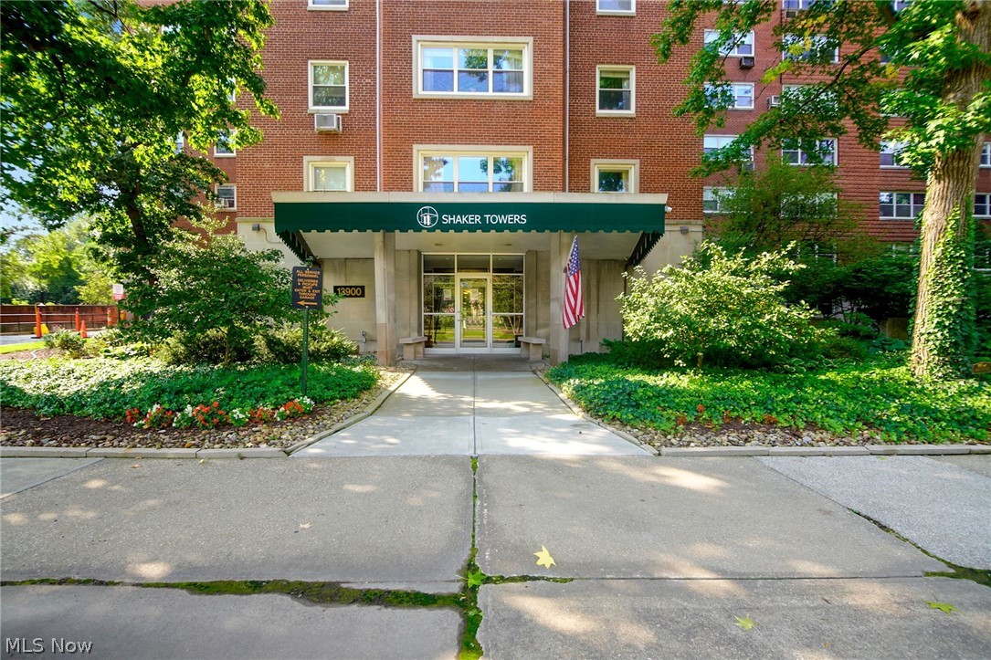 Enjoy easy living in this sophisticated Mid-Century condominium at Shaker Towers.  The unit entrance greets you with a dramatic gallery foyer, hardwood floors, dining room with built-ins and lovely millwork, 2 privately seperated bedroom suites and 2 baths (in-suite in master) boasting nearly 1900 square feet.  Enjoy the dedicated in-suite laundry room with newer washer & dryer.  The galley kitchen is equipped with upgraded stainless steel applicances including stove, refrigerator, dishwasher, range hood and ample storage throughout the unit.  Every room overlooks lush & beautiful treetop views and historic architecture.  Visit the treasured & expansive gardens on the rooftop of the garage.  Indoor garage parking available; 24/7  concierge service from the garage staff, garage space is $50.00 per month, each space.  Only four units per floor insures privacy.
Take advantage of the ameneties such as a Saturday morning stroll to Shaker Square's Farmer's Market...a treat!  Rail transporta