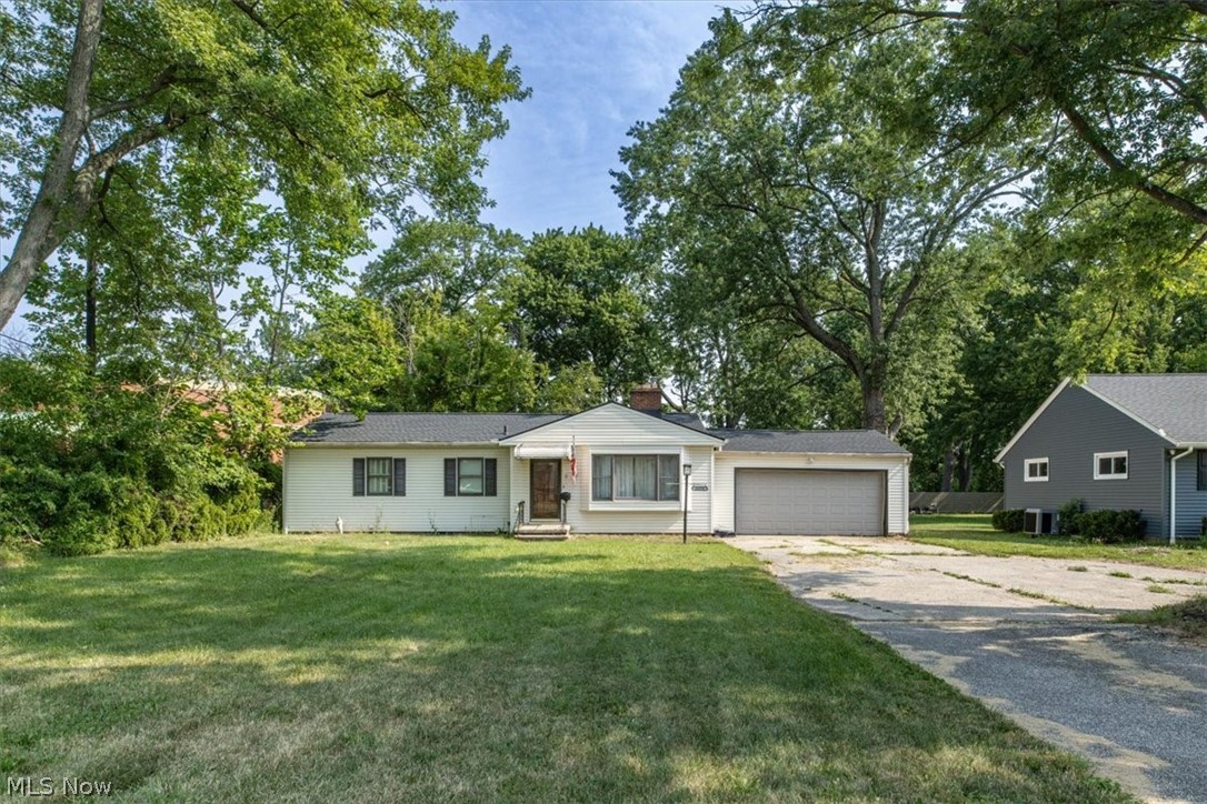 Welcome to 22270 Brookpark Road in Fairview Park! This mid century ranch sits set back approximately 50 ft from the road on a large lot with an expansive backyard. Located near access to major highways, big chain retail shopping and the beautiful Cleveland Metroparks Rocky River Reservation - massive potential awaits any buyer! Customize to your aesthetic with cosmetic updates as needed; the mechanicals and roof are in excellent condition. Original hardwood flooring throughout, an attached garage and a very desirable ranch layout for convenient main floor living make this a great value add opportunity for the next owner. The completely waterproofed full basement doubles the home's usable square footage - essentially a blank canvas for any additional space that suits your needs (recreation, office, entertaining, fitness, etc.). Other highlights include: a new roof and hot water tank (2024), AC (2014), Furnace (1998), and a sump pump believed to be less than 5 years old. This property is an estate, previously owned by a veteran and sheriff who cared for and maintained the home for many years. To top off this rare find, the new Browns dome stadium location will be roughly 2 miles away.