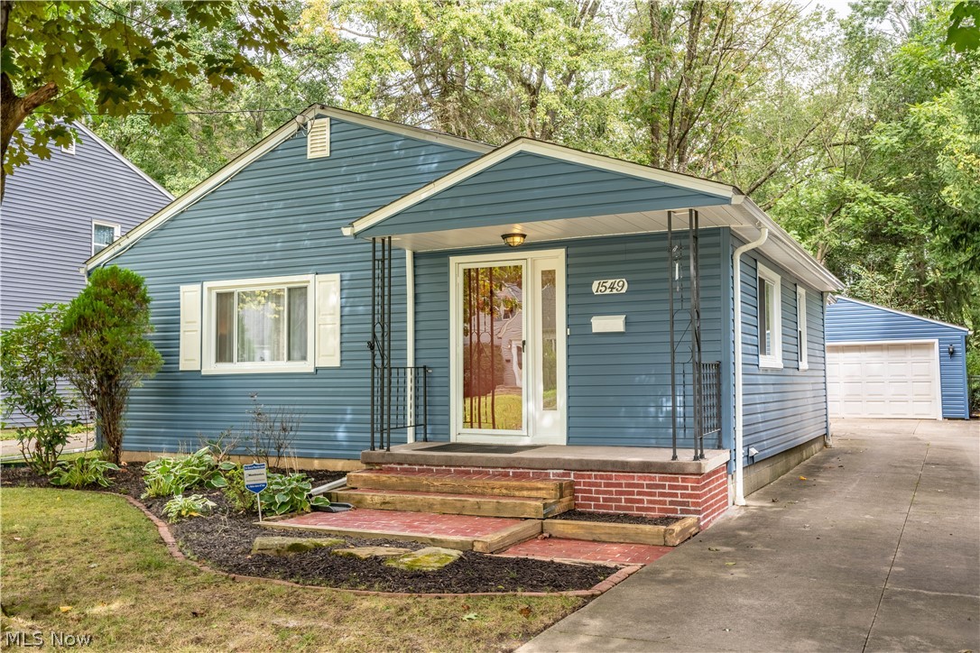 Welcome Home to 1549 Idlewood Avenue in Akron.  Located on a quiet and quaint street in the highly desired Wallhaven area, you can enjoy nearby restaurants, coffee shops, shopping, and so much more. A charming “blue house with the red door” will be how you describe YOUR home to all of your guests.  This spacious and comfortable ranch home features a living and dining room that is well lit with beautiful natural lighting, 3 bedrooms, 1 bathroom and finished basement.  Gorgeous hardwood floors are exposed in the bedrooms and are throughout the home if you so desire.  This home has been carefully rejuvenated and refined and is ready for your personal touch.  The all white kitchen is equipped with a fully operating nostalgic double oven, great for the baker and/or chef of the family! Re-modeled and pristine full bathroom help make this home move-in ready.   The finished basement with plenty of storage and bar is perfect for entertaining.  The backyard can be your private oasis. With a newl