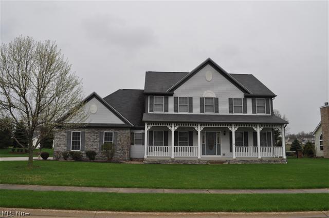 Wow! Not just another place to live, but a lifestyle with Enclave clubhouse and pool.  This stunning stone & vinyl sided home is situated in a prime area.  Loads of updates & all the modern conveniences lets you just move right in.  Features include great room with cozy gas fireplace, french doors leading to living room or office.  The spacious cathedral owner's suite w/glamor bath, dual sinks and walk in closet is privately situated from the other bedrooms. Upgraded kitchen and lighting throughout make this colonial a marvel of open and airy design.  Beautifully decorated interior w/magnificent condition offers enormous bedrooms and baths.  This home has a versatile floor plan and is completely landscaped. Everything about this home radiates refinement starting with the hardwood floors in 2 story foyer.  More value than the price especially considering there is a 4 car garage and sits on a private treed lot.