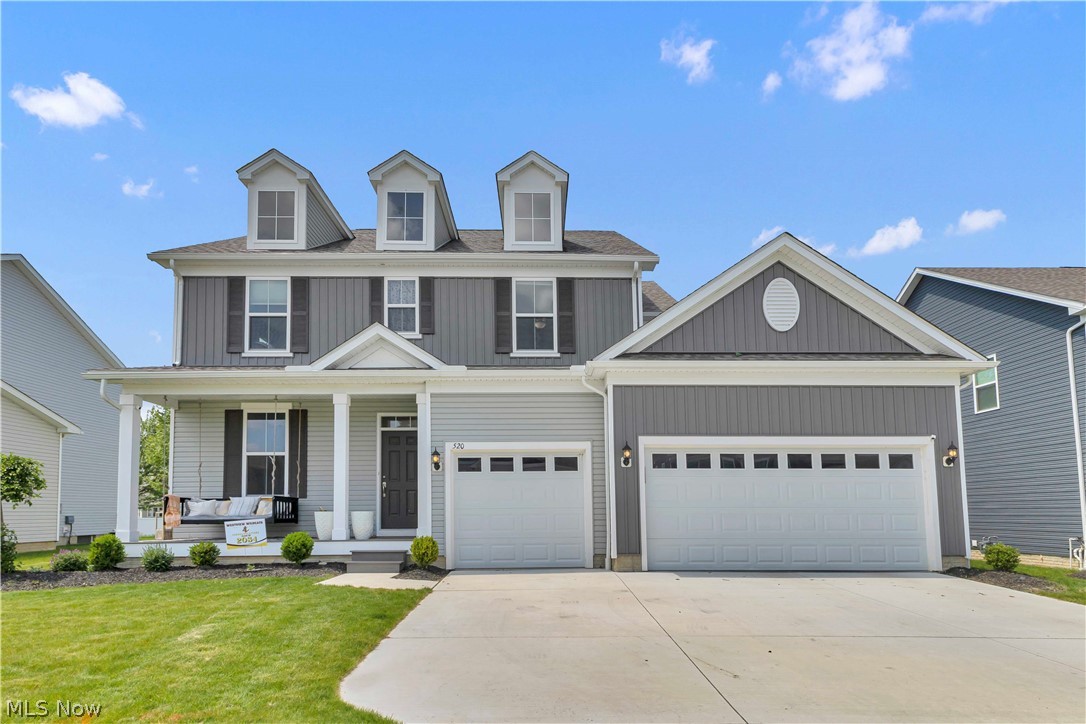 Welcome to this newer-construction Colonial in the desirable Port West community of Avon Lake. Offering over 3,000 square feet, this 4-bedroom home features a modern open-concept layout and sits on a spacious cul-de-sac lot with access to the community pool. Conveniently located near top-rated Avon Lake schools, parks, shopping, dining, Avon, Westlake, and I-90 for easy access to downtown Cleveland, and less than two miles from Lake Erie. The attractive exterior showcases brick accents, dormer windows, a covered front porch, and an attached 3-car garage. Inside, abundant natural light highlights the wide-plank luxury vinyl flooring throughout the main level. The private office features French doors and a tray ceiling. The gourmet kitchen boasts a massive island with seating and undermount sink, pendant lighting, white shaker cabinetry, chevron tile backsplash, quartz countertops, built-in and stainless-steel appliances including a gas range and range hood, and a large walk-in pantry. The kitchen opens to the dining area and spacious great room featuring a soaring vaulted ceiling and dramatic floor-to-ceiling stone fireplace. A planning center/workstation, convenient half bath, and mudroom with coat closet complete the main level. Just steps from the kitchen, the lower-level family room provides additional living space ideal for entertaining or relaxing. The luxurious owner's suite is privately situated at the rear of the home and serves as a peaceful retreat, complete with a tray ceiling, spa-like en-suite bath featuring a beautifully tiled walk-in shower, and a large walk-in closet. Three additional generously sized bedrooms all offer walk-in closets, and the second-floor laundry room adds everyday convenience. A full unfinished basement provides abundant storage and future finishing potential. Outside, enjoy the concrete patio overlooking the backyard. This exceptional home offers the perfect blend of space, style, and location. Schedule your private tour today!