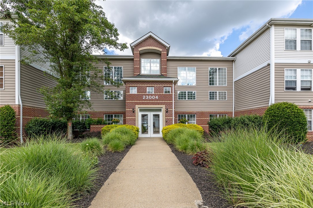 Welcome to easy, maintenance-free living in the Chandlers Lane community of Olmsted Falls! This well-maintained 1 bedroom condo with a versatile den offers a comfortable and functional floor plan perfect for everyday living. The spacious great room features a cozy gas fireplace and opens to the dining area and private balcony, creating an inviting space to relax or entertain.
The kitchen is equipped with ample cabinetry, a convenient breakfast bar, and all appliances included. The generous owner's suite showcases a walk-in closet and is complemented by a nicely appointed full bathroom. An in-suite laundry room with washer and dryer adds everyday convenience. Additional highlights include a private 1-car garage with opener, a dedicated storage locker located on the same floor, building elevator and an affordable monthly maintenance fee! The community offers a pond, gazebo, and walking paths. Enjoy low-maintenance living in a convenient location close to shopping, dining, parks, and major highways. Move right in and enjoy all that Chandlers Lane has to offer!