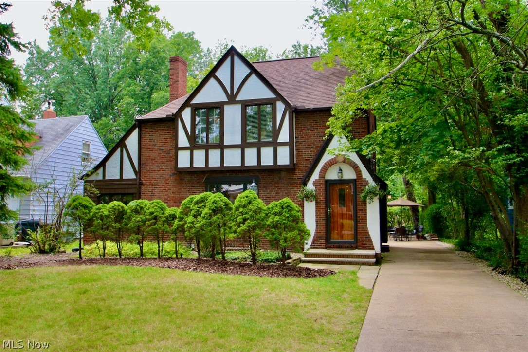 This absolutely charming 1930's colonial awaits you.   Many updates to include a New Hot Water Tank, Furnace & A/C in 2009.  Roof replaced in 2003, New Electric Panel & Sub Panel for the garage 2019.  Full Bath and Half Bath completely remodeled in 2021.  Full bath features porcelain flooring, subway tile, new commode, sink and hardware.  Half bath features a slate floor, new commode, sink and hardware.   Hang your coats and bags in the newly made clothing rack and storage area in the kitchen.  The office off the living room has a heated slate floor.   Gas Fireplace (gas insert installed 2021), Home Interior Paint 2021, Front Stucco repaired 2018.   The 2 Car Garage (20 x 20) has been converted to a Home Work and Workout Space, complete with heat & A/C and can be converted back.   The charming sun porch has beautiful sandstone flooring.    Relax in the beautiful yard and outdoor fireplace area that offers some privacy