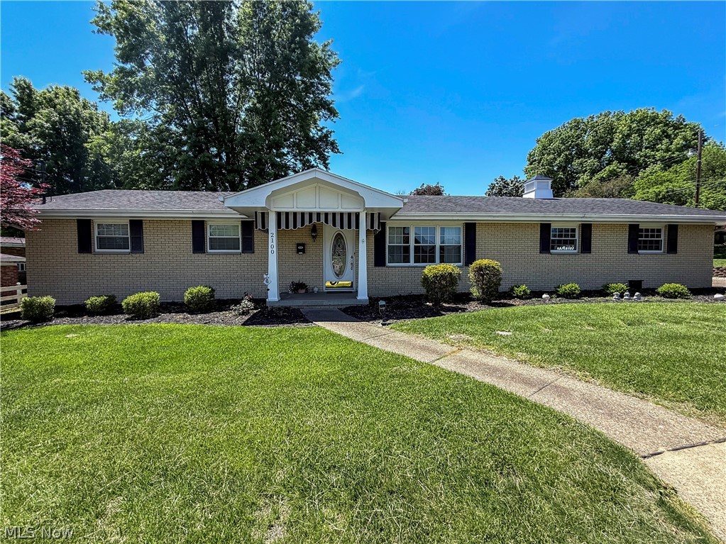 This immaculate Brick Ranch is looking for it's new owner! Fantastic North Parkersburg location close to many amenities and golf course. This 3 bedroom, 2 full bath home has been meticulously maintained and does not disappoint! Beautiful kitchen with stainless appliances, great first floor laundry room, large recreation room in the basement plus lots of room for storage. Screened back porch. Plenty of off street parking on paved driveway plus 2 car attached garage. New large storage building (10 x 16) with gutters,  built-in shelving and electric.