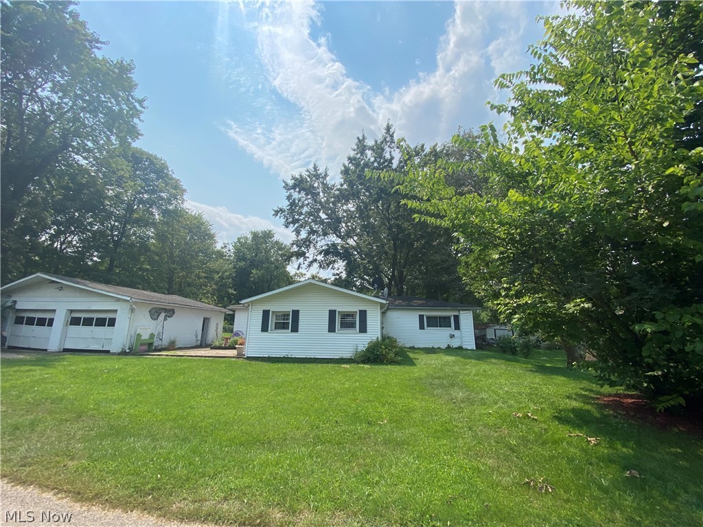Check out this 1500 sqft house with 2 car detached garage within close walking distance to buckey lake. Enjoy all buckey lake area has to offer, beach, bike trails, bars, restaurants, sunset views and so much more. Would make a great house to fix and flip or to fix up and make your own. Priced to sell!
