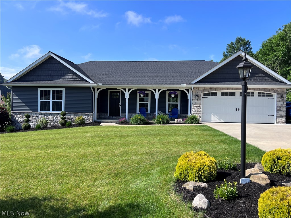 Welcome to this beautiful 6 bedroom and 3 full bathrooms home located in highly desirable Meadow Glen! Built in 2020 and exceptionally well maintained, this move-in ready home offers an open-concept main living area featuring a spacious kitchen, dining area, and living room. The main level includes a primary suite with walk-in closet, two additional bedrooms, a bathroom and convenient first-floor laundry. The fully finished lower level provides three additional bedrooms, a full bathroom and a large family room, offering abundant living space. Gorgeous finishes throughout and meticulously cared for inside and out. Exterior features include a covered front porch, back patio, and attached 2-car garage. A must-see property with space, style, and comfort throughout!