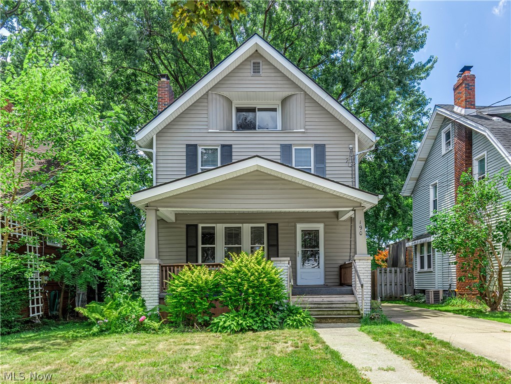 Bring your vision and make this charming Colonial your own! Full of character and timeless details, this 4-bedroom, 1.5-bath home offers plenty of space and endless potential. A welcoming covered front porch sets the stage as you enter to discover beautiful original woodwork that adds warmth and classic charm throughout. The spacious living room features built-in shelving and a whitewashed brick fireplace (decorative and no longer in use), creating a cozy focal point while opening seamlessly to the formal dining room with built-in storage. The kitchen offers two-tone cabinetry with crisp white upper cabinets, soft gray lower cabinets, and a stylish tile backsplash. A convenient first-floor half bath is perfect for guests, while the rear entrance opens to a small covered porch overlooking the fenced backyard. Upstairs, you'll find three bedrooms with hardwood flooring and a full bath. The finished third floor serves as a fourth bedroom and could also make an ideal home office, recreation room, hobby space, or flex area to suit your needs. Additional features include a one-car detached garage and a fenced backyard. With a little TLC, this home presents a wonderful opportunity for homeowners looking to build equity or investors seeking their next addition to a rental portfolio. Don't miss the chance to restore the beauty and character this classic Colonial has to offer!