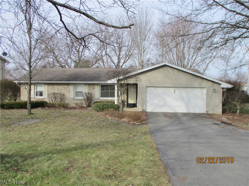 Ready to move in!  Brick & vinyl 3 bedroom Ranch with private fenced-in backyard.  Large living room with beautiful gray ceramic tiles (looks like wood).  The dining room and family room also have ceramic tile flooring for easy lifestyle.  The 3 bedrooms have carpet. First floor laundry.  The sliding doors in the family room open to a beautiful brick patio.  Two car garage and shed.