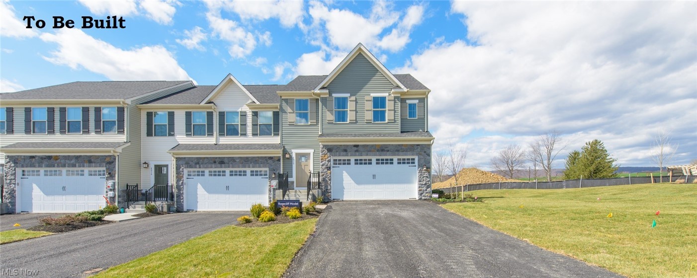 Whether you’re looking for your first home or want brand new everything, you can find it at Hillshire Woods in Concord Township. This ultimate convenient location is 2 minutes from Route 44, I-90, shopping, and dining!  This beautiful NEW Rosecliff townhome radiates elegance by blending sophistication and low-maintenance living.  It sits in one of the most DESIRABLE locations in the highly desirable Riverside Local school district.  This desirable end unit home has stone accented cottage style exterior. The open concept living makes entertaining a breeze with a large island as the heart of the first floor.  HGTV inspired designer finishes including stainless appliances, granite kitchen counter-top, luxury 42” cabinets.  This home has a 2 foot extension and a country kitchen offering even more space!    How about a cozy fireplace in the great room!  Upstairs the owner’s suite includes a tray ceiling, a huge walk-in closet & en-suite bath with comfort height double vanity, a ceramic tile