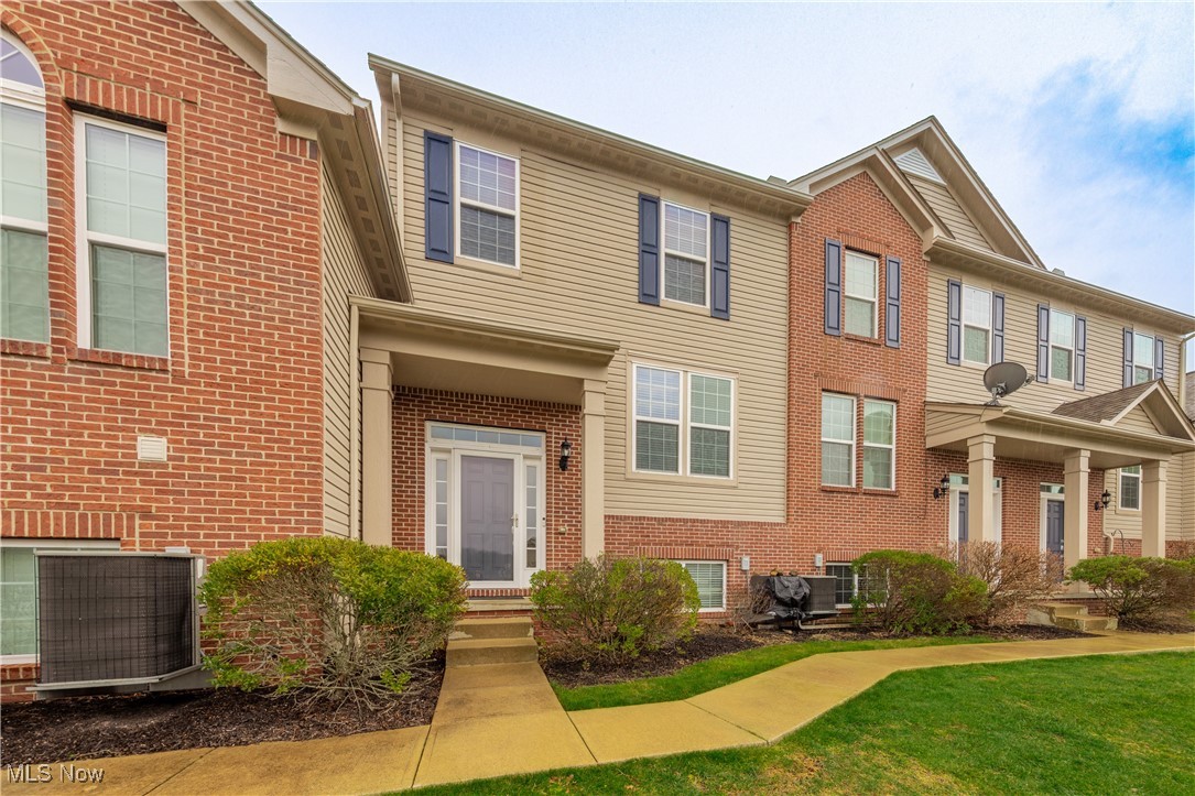 Welcome to 386 Caleb Dr in Copley! This beautiful 2 bedroom, 1.5 bath move-in ready townhome offers modern living in a quiet, peaceful community, while located just minutes from fantastic dining, shopping and convenient freeway access. Step inside to find a large living room with dual sided gas fireplace, that flows seamlessly into the dining area. The large eat-in kitchen features newer appliances and a center island, perfect for gatherings. Off the kitchen you'll find a half bath and laundry room. Plus access to the deck, ideal for enjoying your morning coffee or evening relaxation. Upstairs you'll find a spacious master suite which features an ensuite bathroom and walk-in closet. Plus second bedroom, and a loft area, perfect for an at home office space.  The finished lower level provides extra living space and can function as a workout room or possible third bedroom. A 2 car attached garage adds both convenience and extra storage, and is equipped with a 220V plug for EV charging. Recent updates include hot water tank, furnace, paint, carpet on the lower level, and more! With maintenance free living in a prime location...make Caleb Drive your new home!