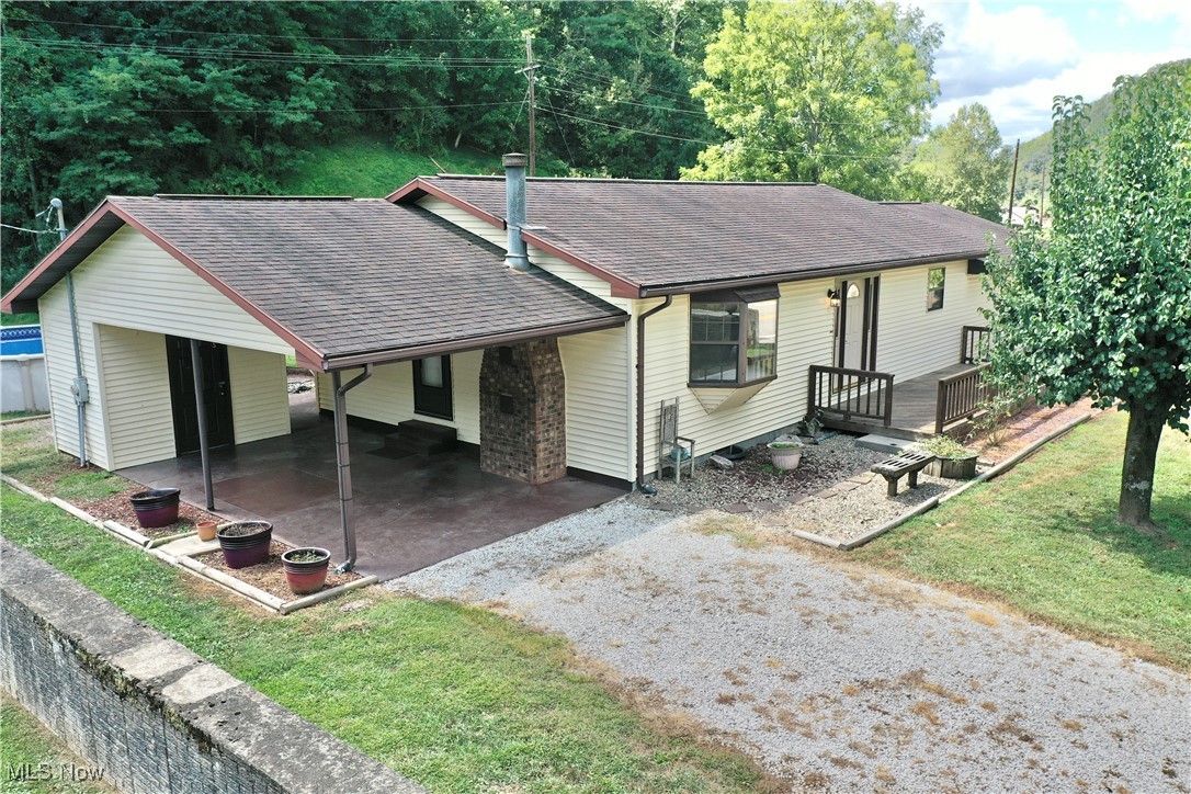 12463 S. Calhoun Hwy, Arnoldsburg, WV, offers 1.65 acres of usable, well-laid-out land paired with a spacious single-level home—ideal for comfortable rural living, entertaining, and an easy work commute located between Spencer and Grantsville. This one-level home features 3 bedrooms and 2 bathrooms, with approximately 1,300 square feet of living space. The living room is centered around a wood-burning fireplace, while the large eat-in kitchen—with appliances included—leads out to a covered back patio and pool area, perfect for summer gatherings. The master suite is spacious and includes an attached office or study, which also opens to a side deck for outdoor access. The exterior offers plenty of room for both leisure and functionality. There’s a large front deck, a level backyard, and a small creek that winds through the back of the property. Additional features include a kids' playhouse, 8x16 storage shed, and room for a small garden. A covered carport is attached to the home and includes a utility building for extra storage, plus there’s an additional freestanding carport on the property. Utilities include city water, city sewer, electricity, and natural gas, plus a functioning water well is also located on the property for additional water access. The home is outside of the 100-year flood plain, offering added peace of mind. Whether you're starting a homestead, need space for the family, or want a comfortable home with room to grow, 12463 S. Calhoun Hwy offers the perfect setup. Schedule a showing today.
